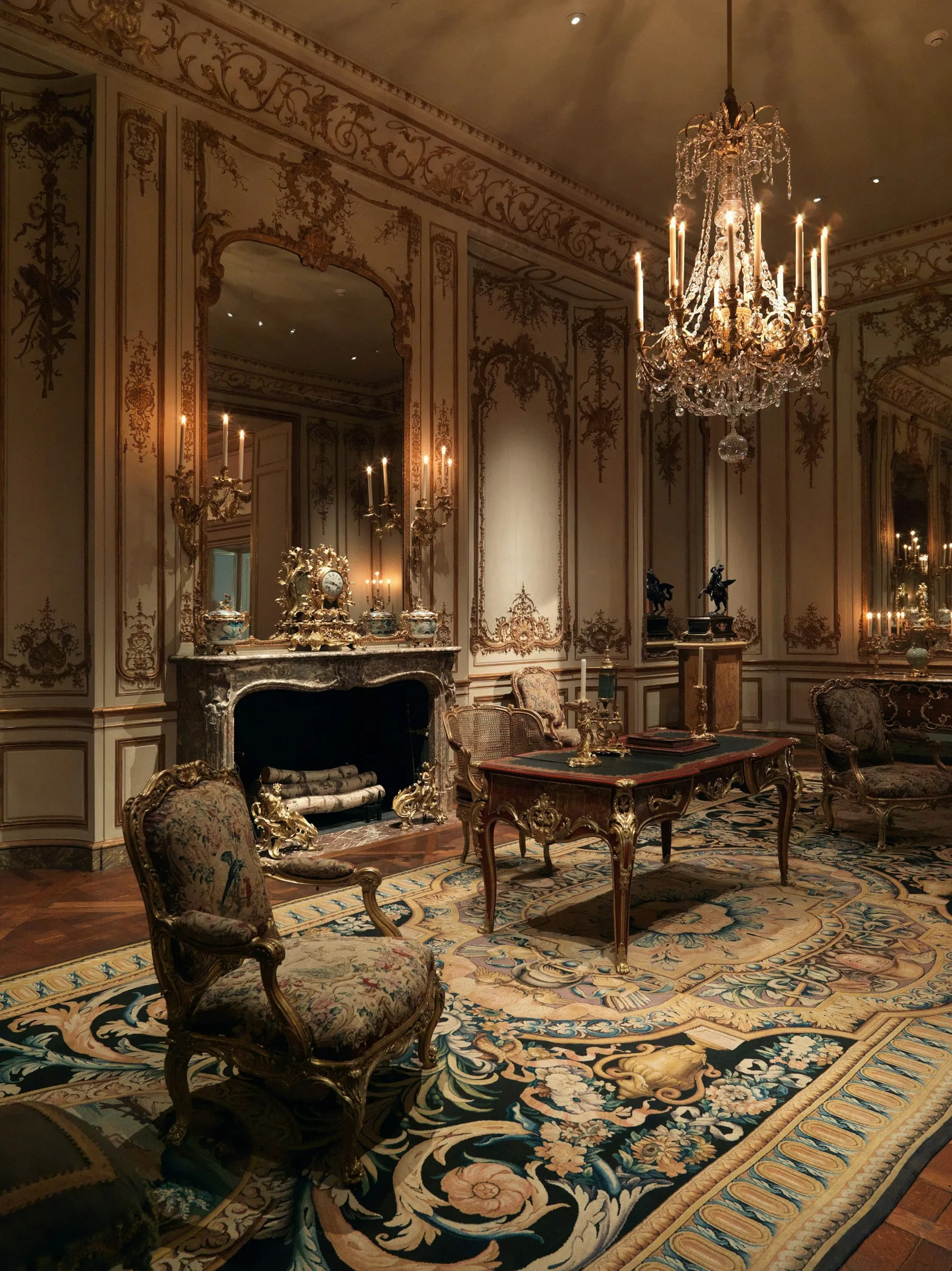 State room with fireplace and crystal chandelier